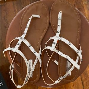 Studded white flat sandals